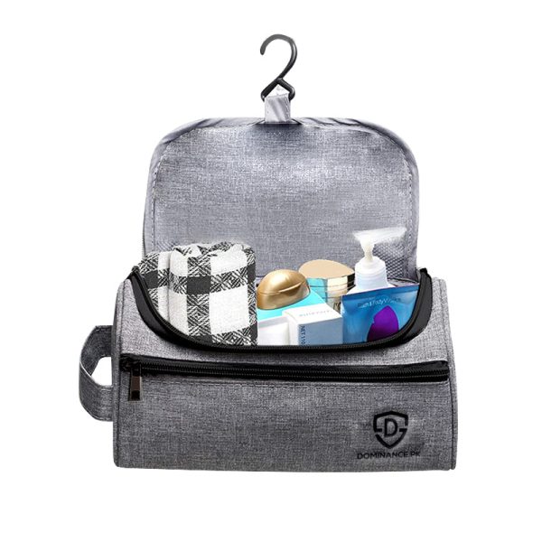 Grey colored, hanging, waterproof toiletry bag with external and internal pockets.