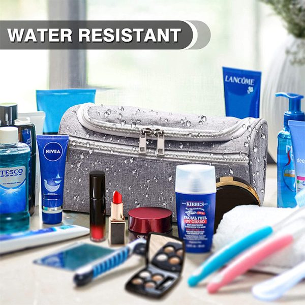 Grey colored, waterproof, hanging toiletry bag with inner and outer pockets..